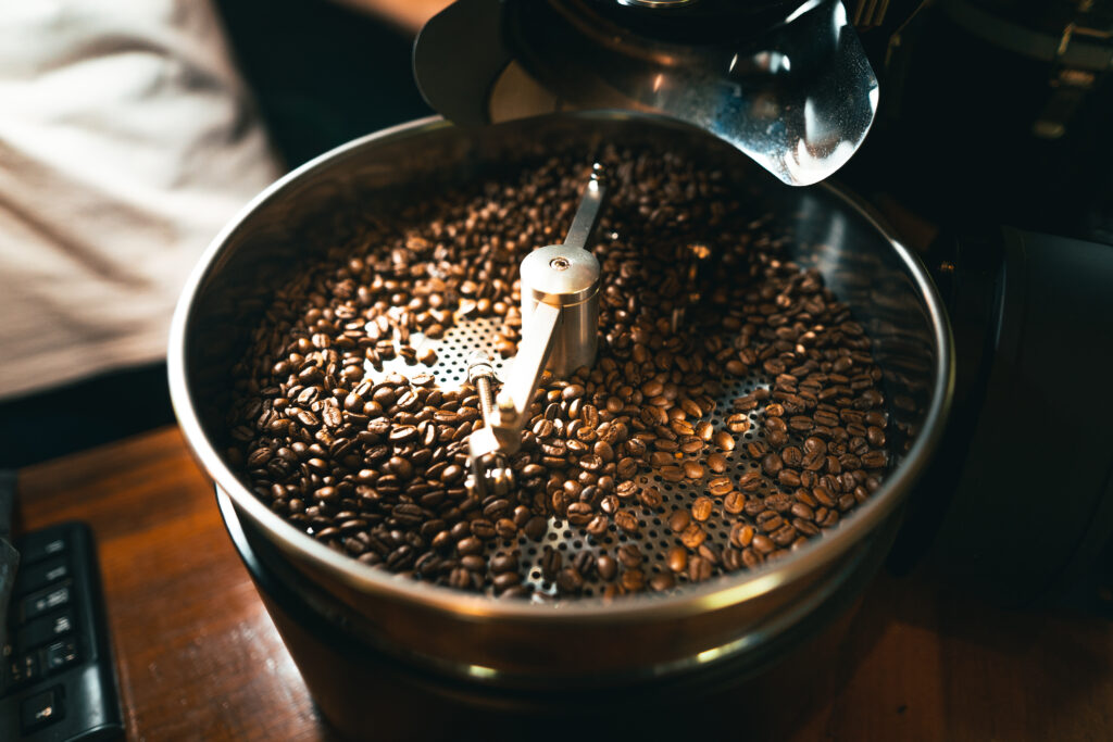 Roasted coffee beans in the machine
