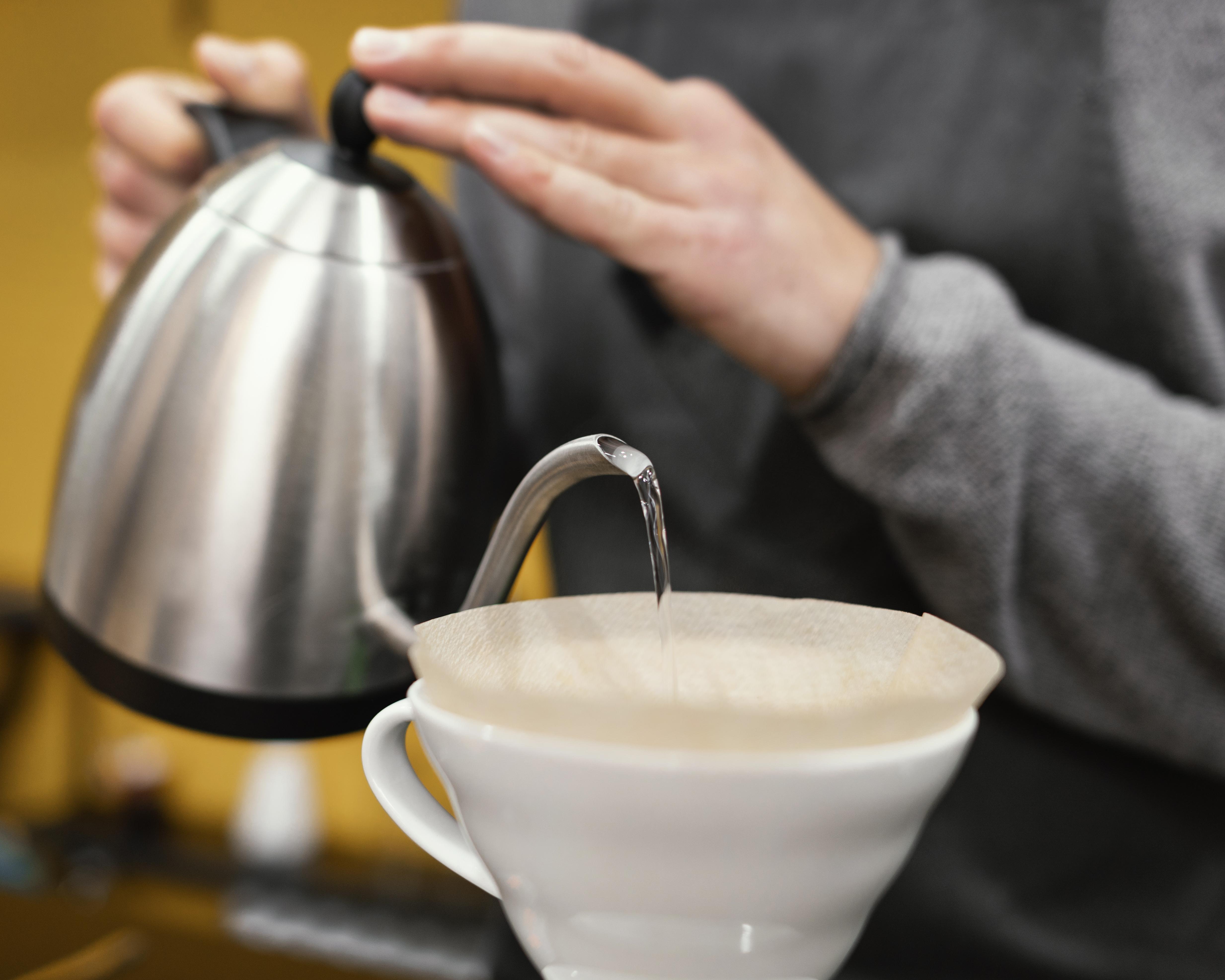 Pouring water in coffee filter