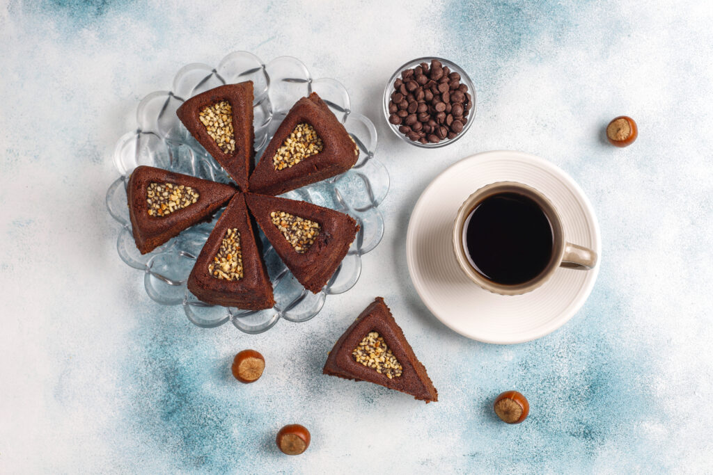 Coffee-Flavoured Chocolate Desserts sliced brownie cake with hazelnuts
